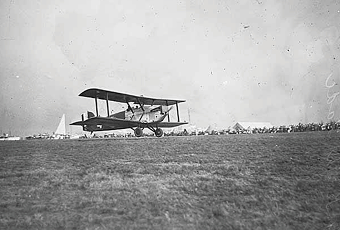 A black and white photo of one of the airplanes that completed the first circumnavigation of the globe.